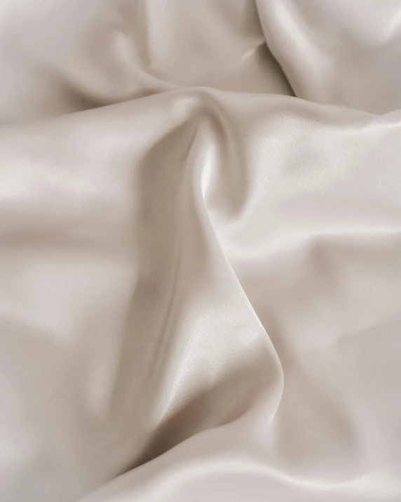 plain white sheets textured with soft lines and folds