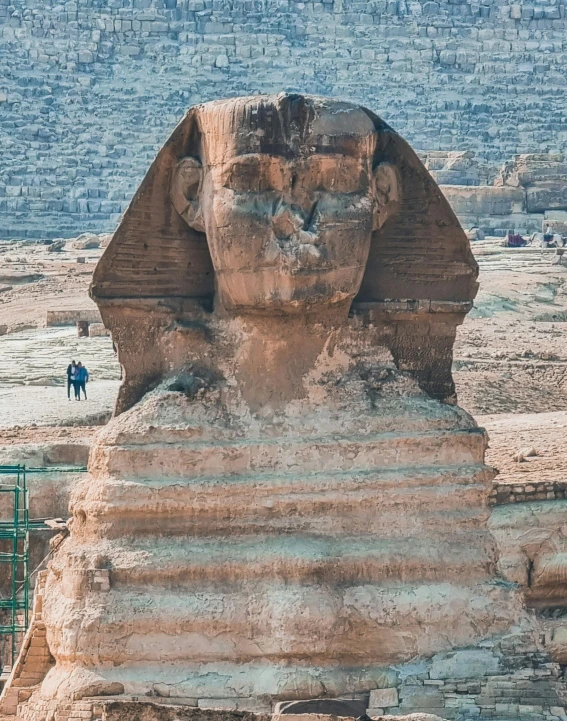 the sphinx of tut, located by a large brick monument