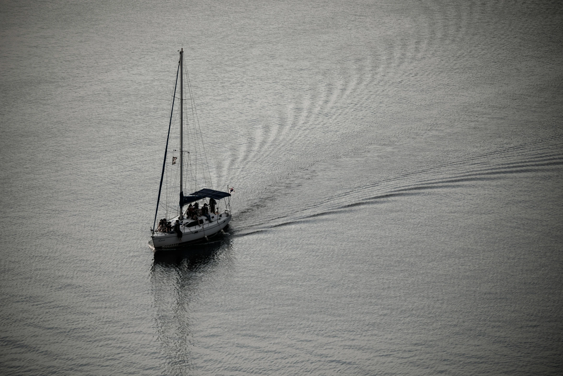 an image of a boat traveling down a river