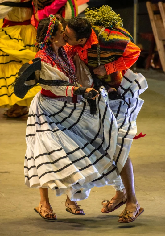 dancers performing on the street during a festival