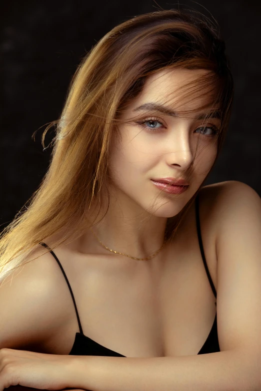 a close up of a young woman with long blonde hair