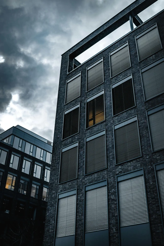 a building is sitting under cloudy skies