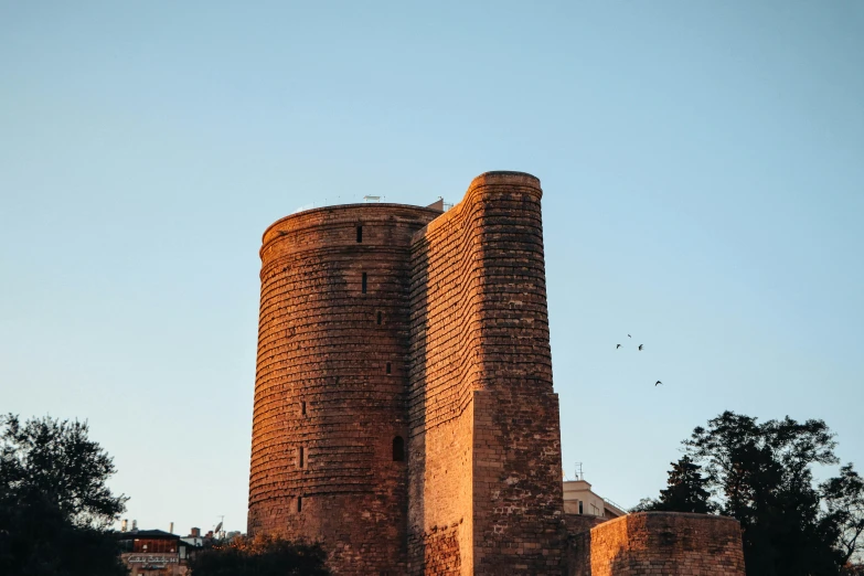 this tower has a stone structure on the sides of it