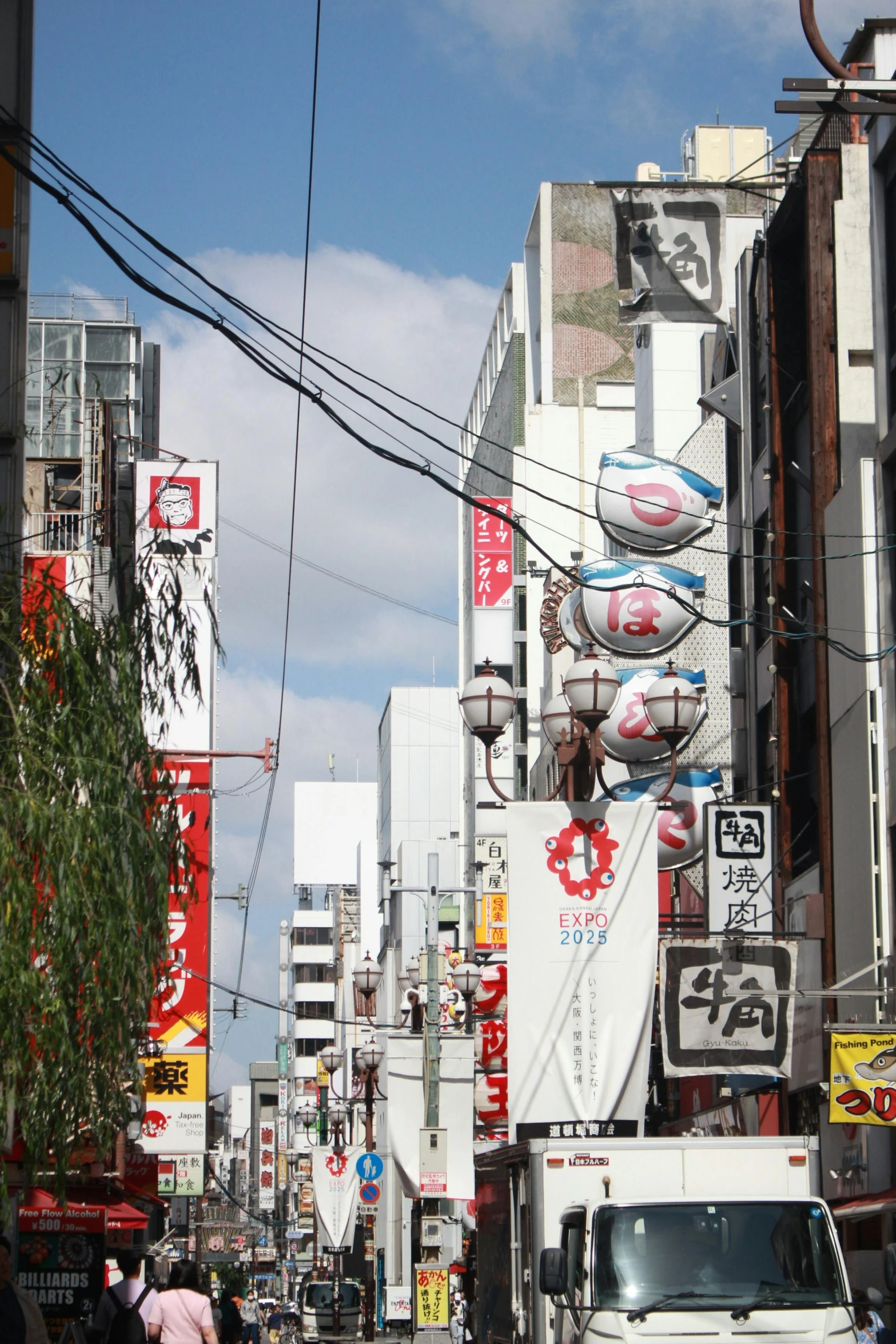 a truck on a busy street with other cars on it