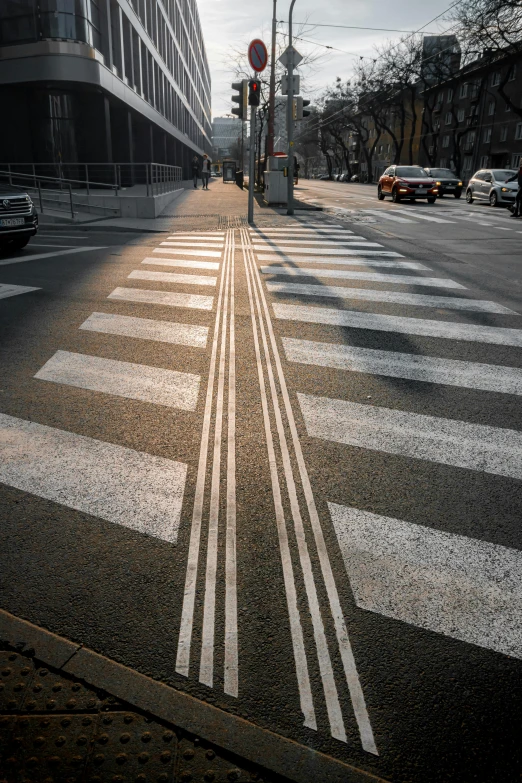 a street is shown with white lines painted on it