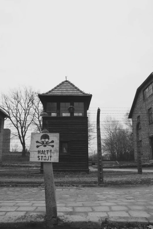 an old railroad station in black and white