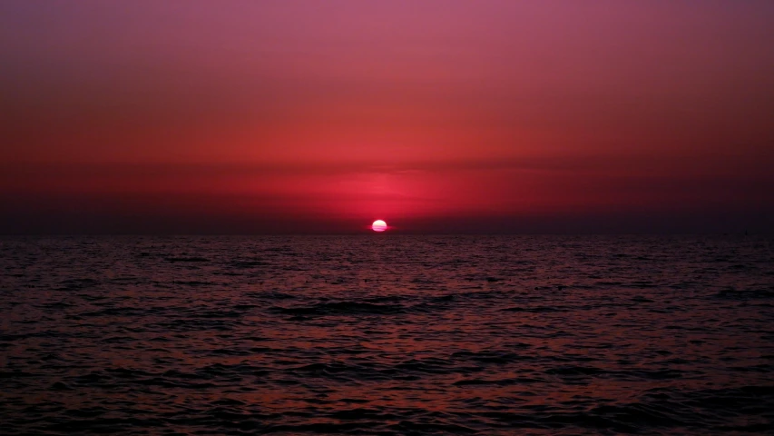 sunset on the horizon over the ocean