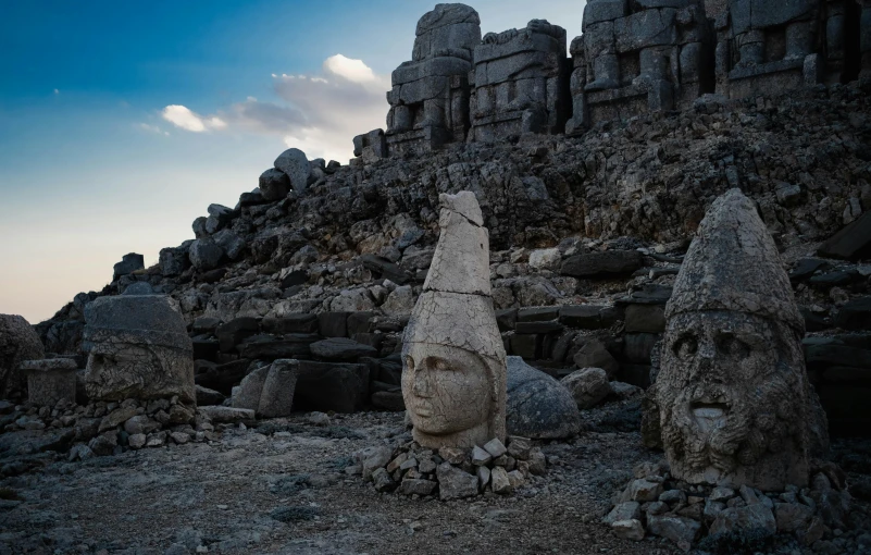 the remains of ancient carved rocks are visible