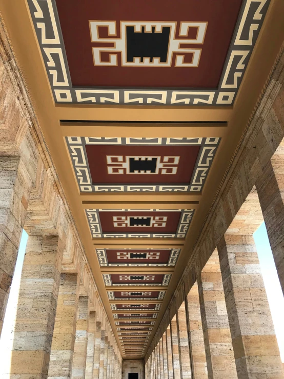 the ceiling of a building is decorated with intricate designs