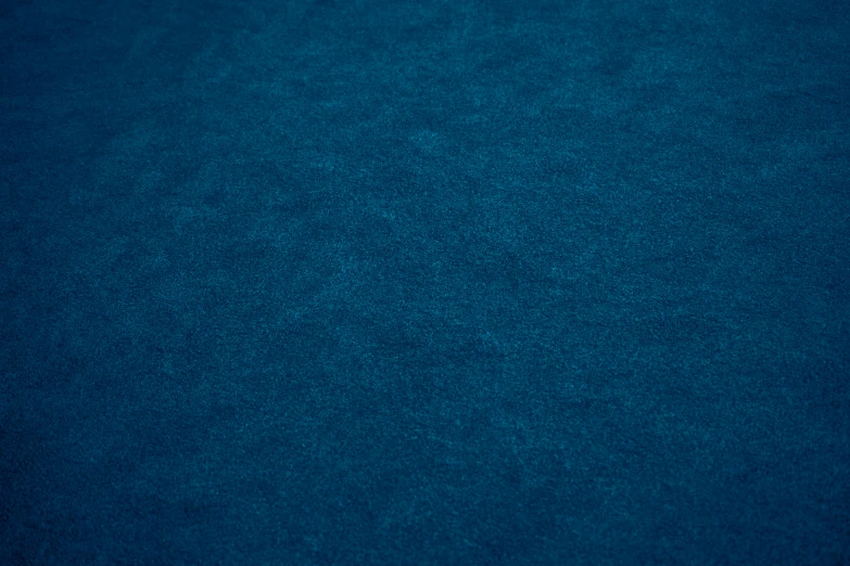 a background texture of blue wool material