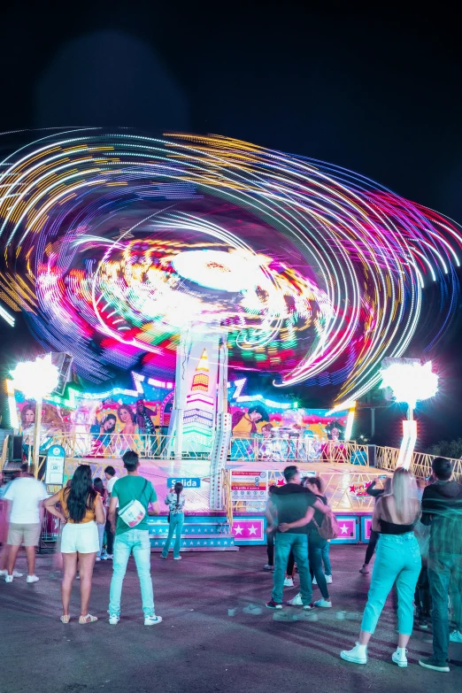 the carnival is full of lights and a carousel