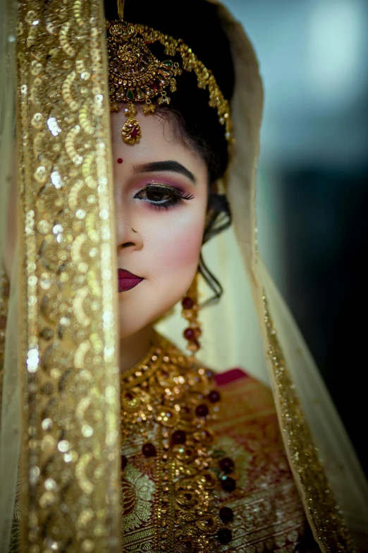 the face and shoulders of a bridal bride