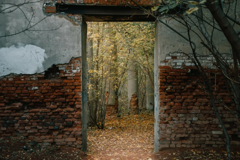 there is a doorway in a brick building