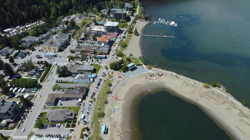 an aerial po of a town and its river