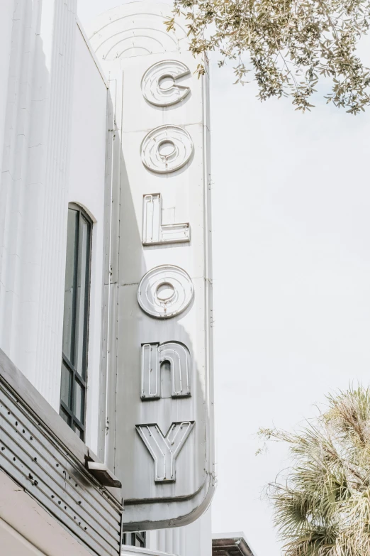 a sign is attached to the side of a building