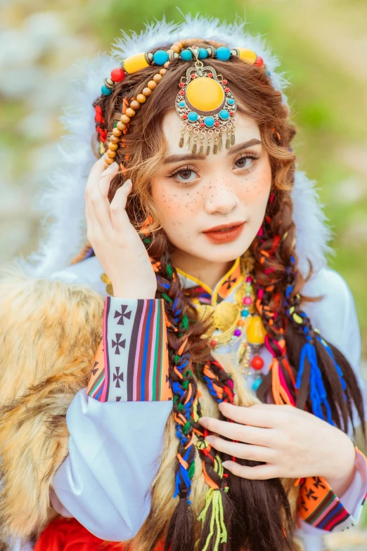 a woman in an indian style headdress