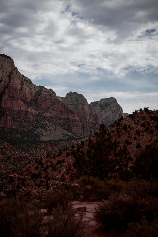 a big mountain range with a large mountain behind it