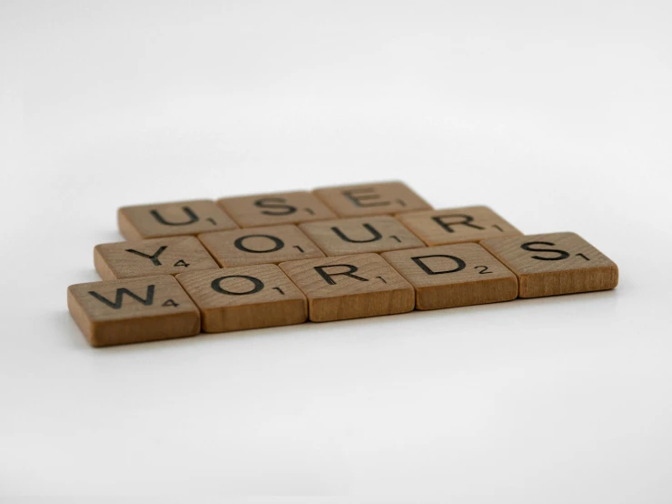 the words are arranged with blocks that spell out use your words