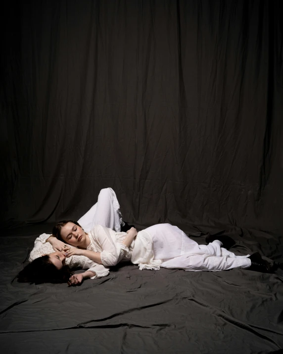 woman in a white dress laying down