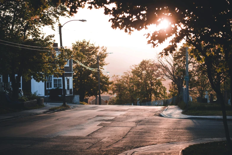 a stop sign and street light on a street