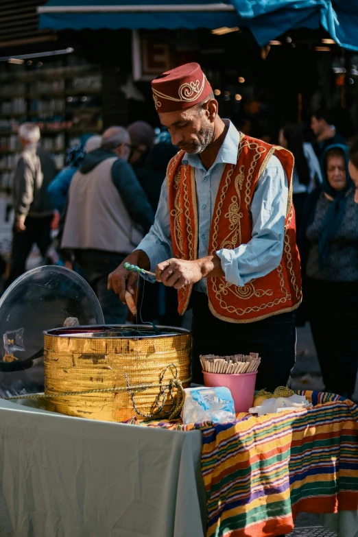 a man that is in front of some food