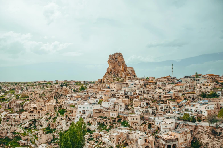 an image of a city that is sitting on a hill