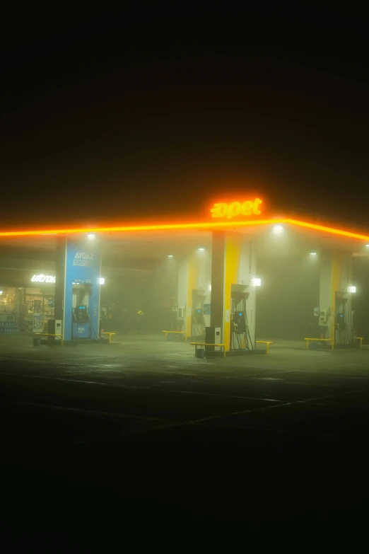 gas station at night in fog and fog with the lights on