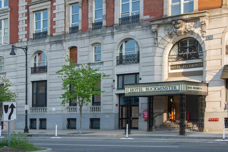 a tall building with a sign above it that reads a store