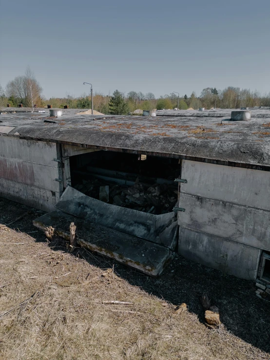 the old run down barn has been destroyed into pieces