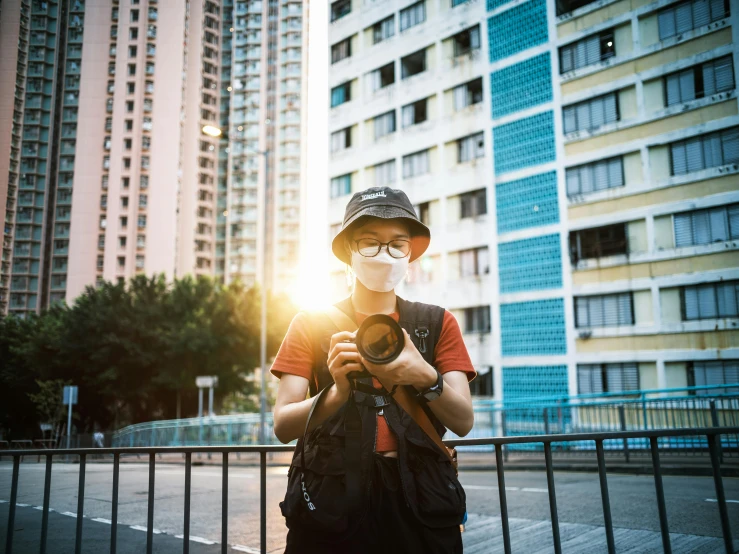 a woman taking a picture with her camera