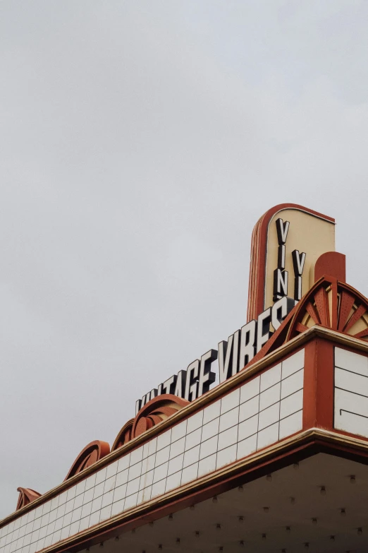 an old theater sign with the word, may the devil start to sing