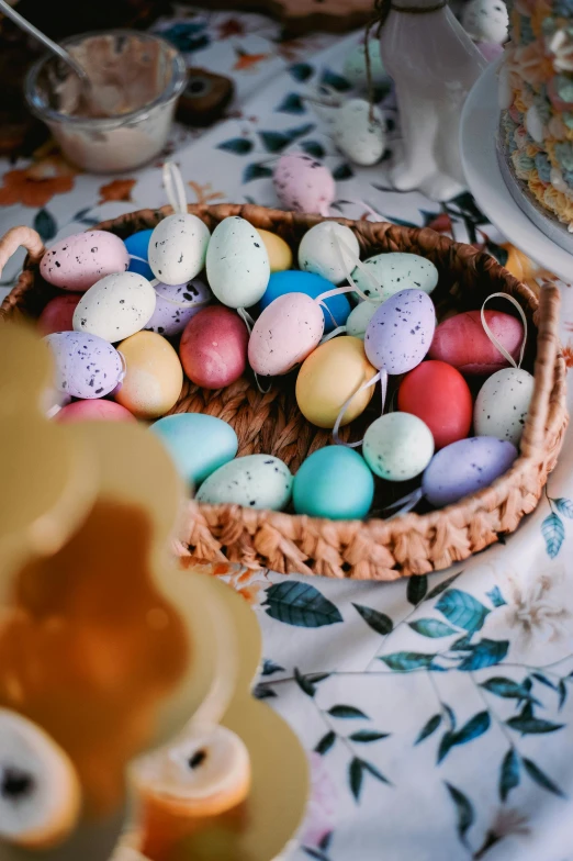 some little egg on a table with other eggs