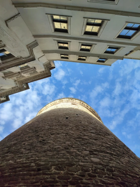 an old stone building is shown from beneath the ceiling