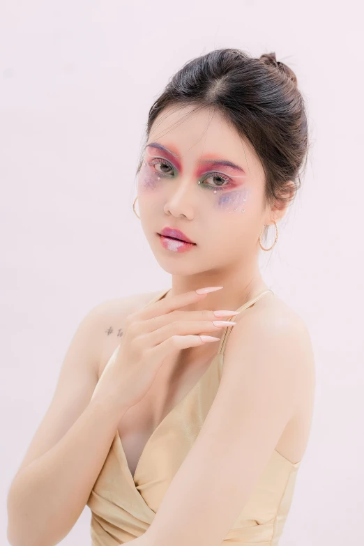 a girl poses for a po in an elegant dress