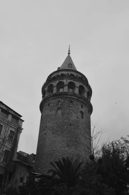 an old building with a tower and clock on top