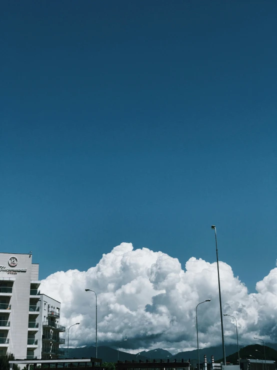 a picture of the sky and clouds at an airport