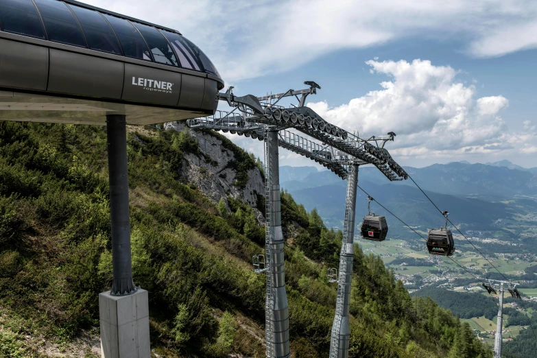 the gondola is over and has lots of cars to ride down