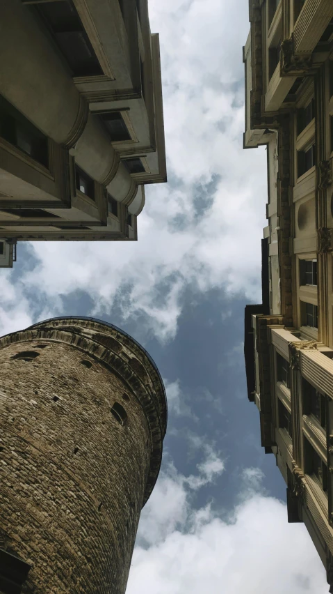 looking up at the side of a tall building