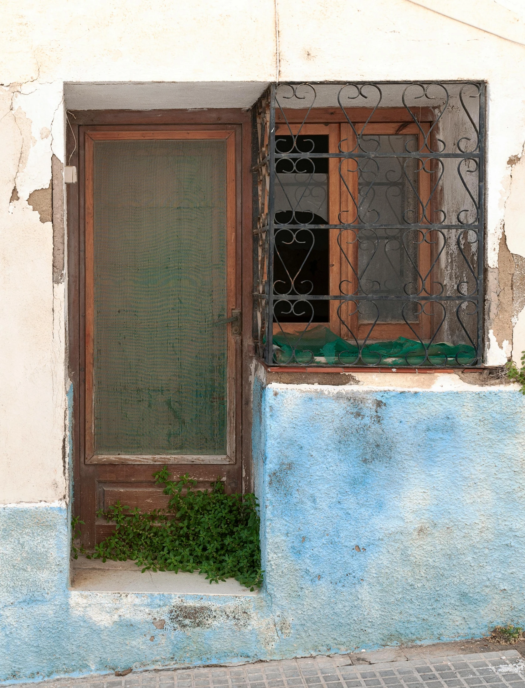 an open window on the side of a building