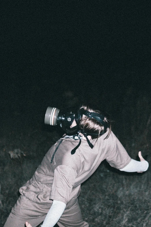 person wearing glasses and carrying a camera on his back