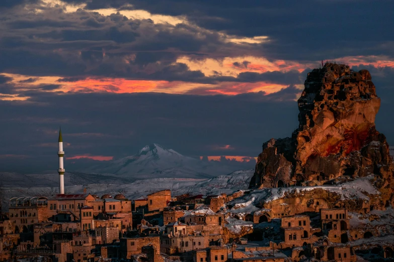 a very pretty city under a very tall mountain