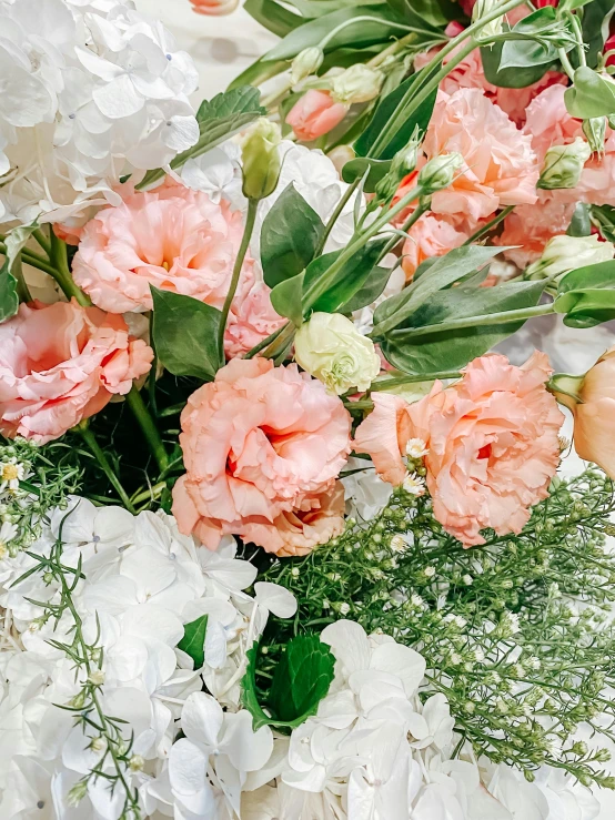 an arrangement of flowers displayed on a table