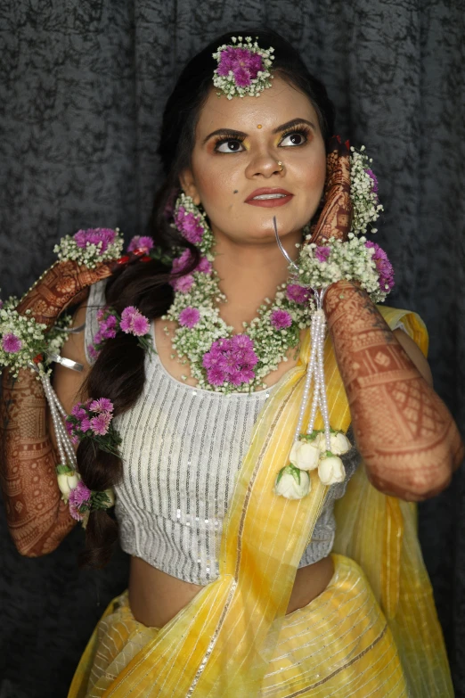 a girl with flower garland on her head