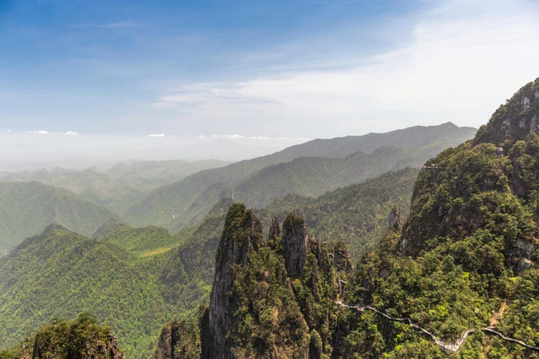 the mountains are covered with mist and cloud