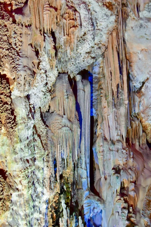 colorful and decorative rock formation with blue pipe