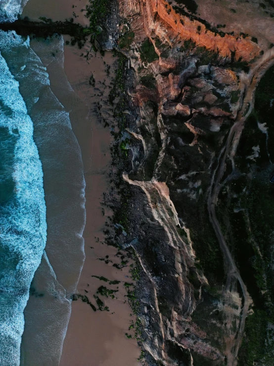 aerial view of beach and coast next to coastline