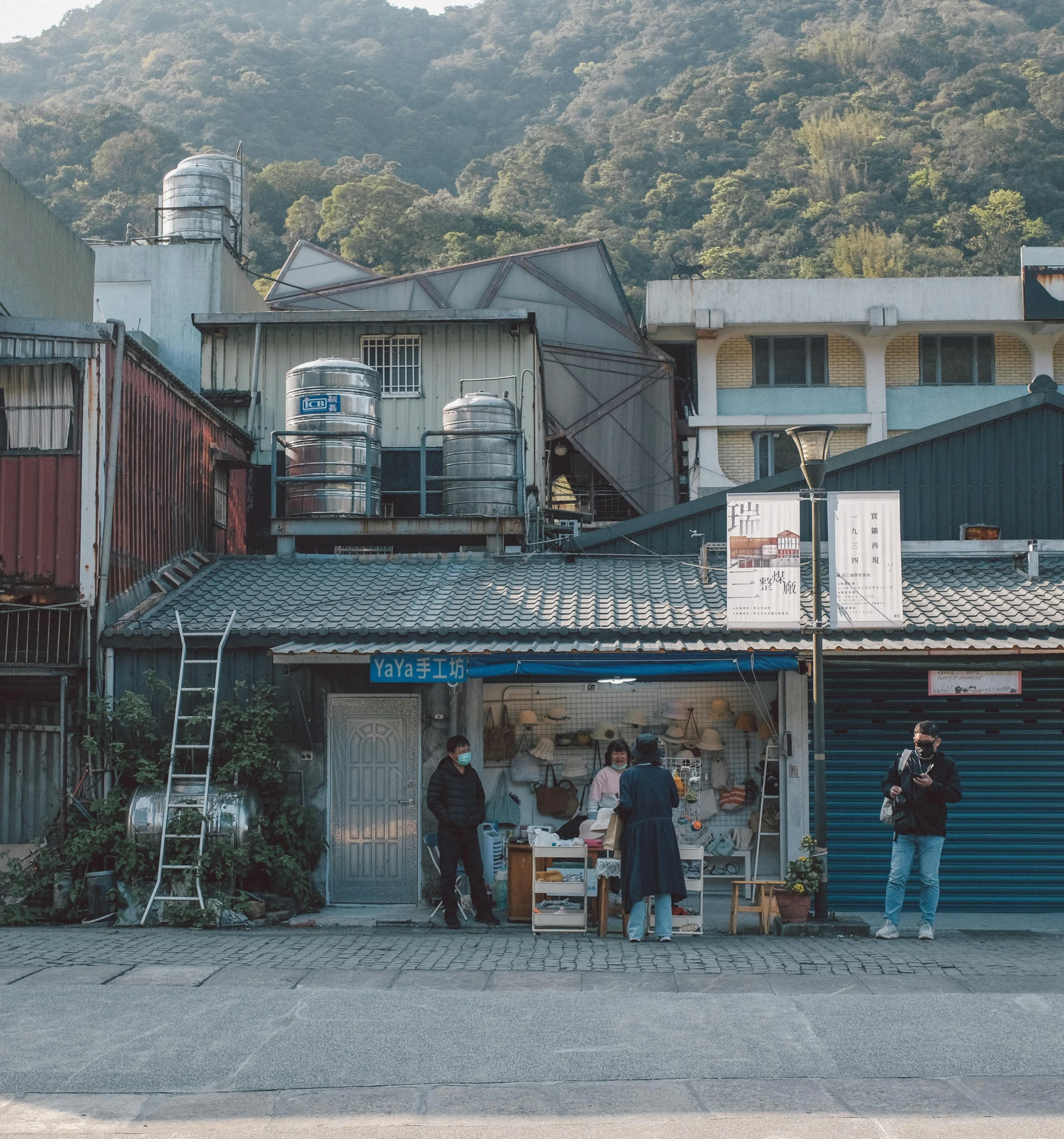 a group of people are standing outside a restaurant