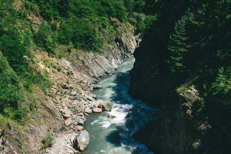 looking down at a river and mountains from above