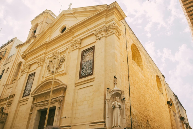 an old church building with a clock on it