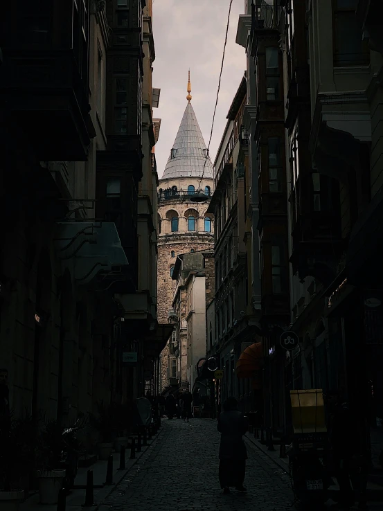 a cobblestone street in an old city